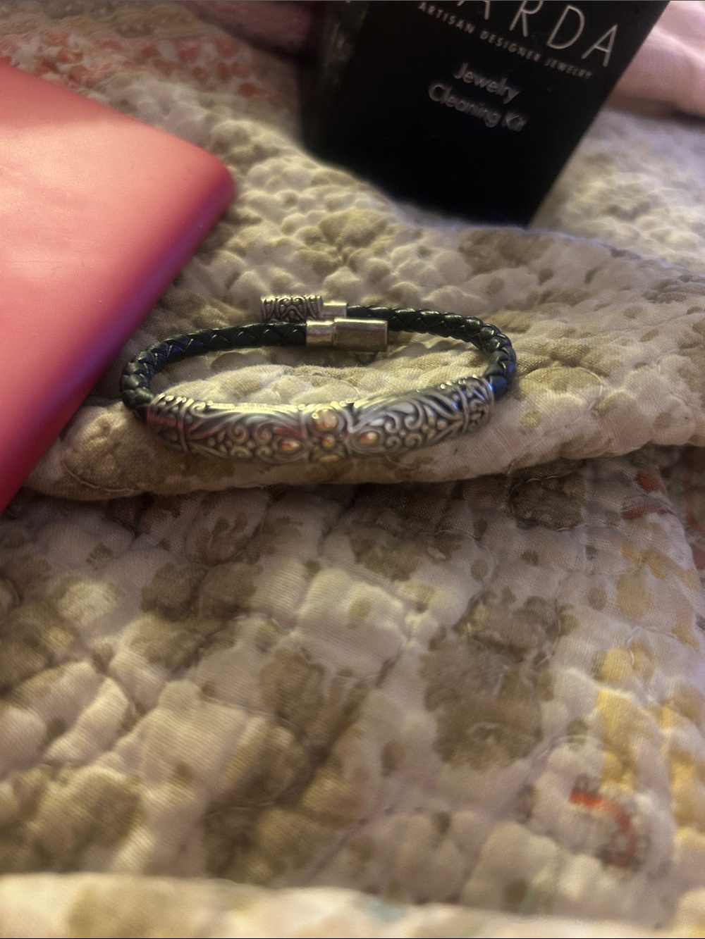 Leather and silver bracelet with gold accents